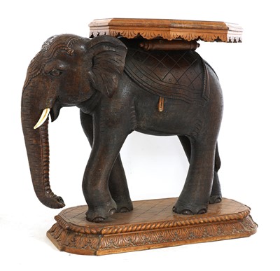 Lot 951 - An Indian sandalwood occasional table in the form of an elephant
