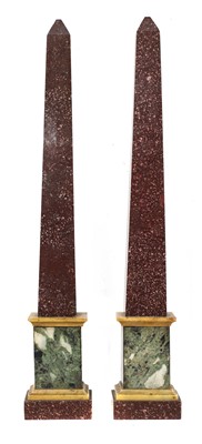 Lot 361 - A pair of porphyry obelisks