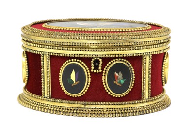 Lot 289 - An oval gilt-metal and pietra dura inset casket, by Tahan, Paris