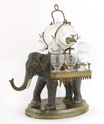 Lot 270 - A cold-painted elephant liqueur set