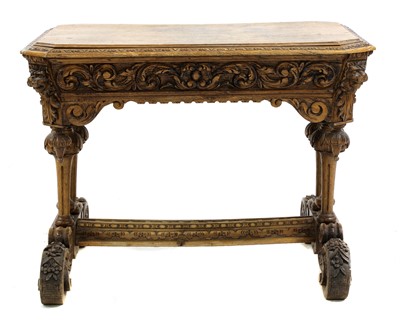 Lot 123 - A carved oak centre table