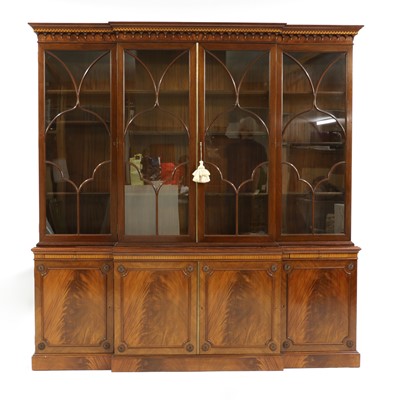 Lot 538 - A large mahogany breakfront glazed bookcase