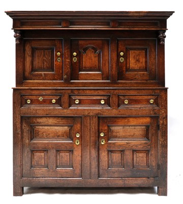 Lot 717 - A George III Welsh oak press cupboard