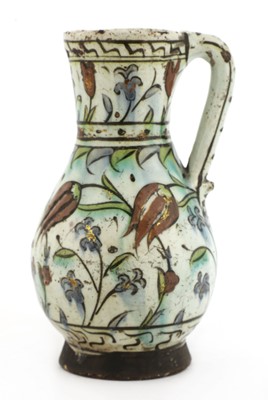 Lot 714 - An Ottoman Iznik pottery jug