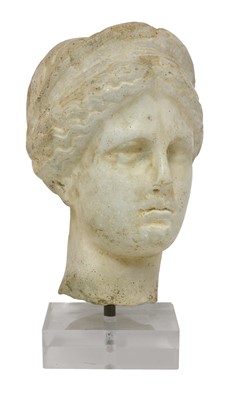 Lot 865 - A grand tour carved marble or limestone head of Diana