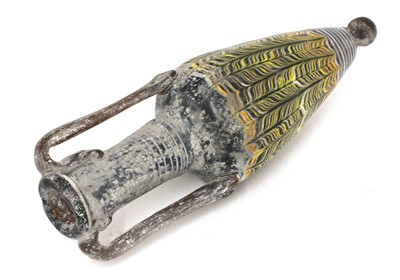 Lot 924 - A Roman marbled glass bottle