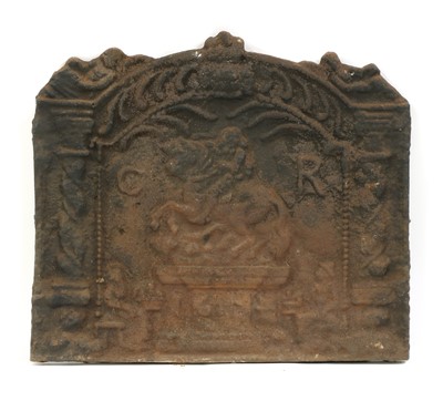 Lot 709 - A cast-iron fire back