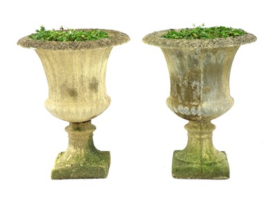 Lot 382 - A pair of composite stone campana garden urns