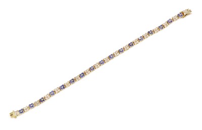 Lot 301 - An 18ct gold sapphire and diamond line bracelet