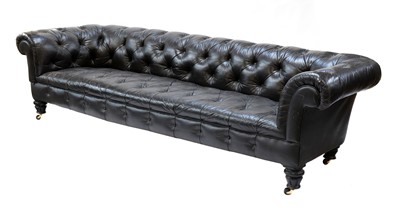 Lot 211 - A large buttoned leather chesterfield sofa