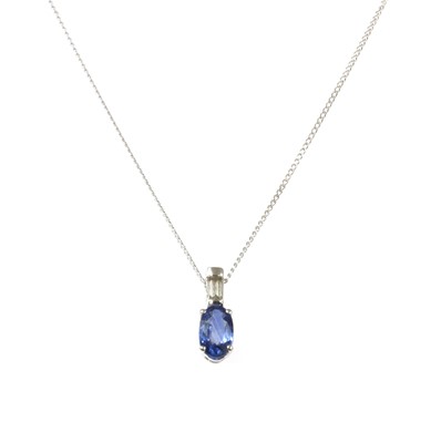 Lot 131 - A white gold sapphire and diamond pendant