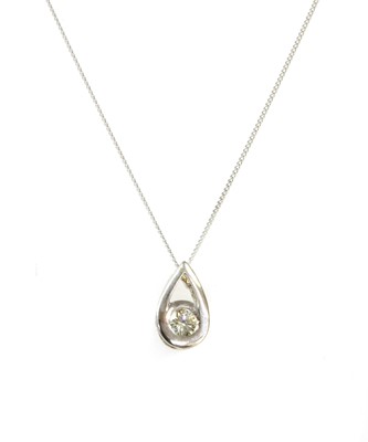 Lot 91 - An 18ct white gold single stone diamond pendant