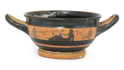 Lot 923 - A Greek black glazed figure kylix