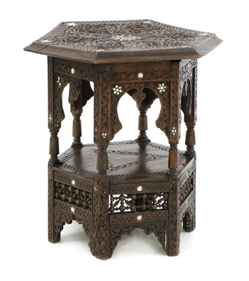 Lot 968 - A Syrian carved hardwood and mother-of-pearl inlaid occasional table