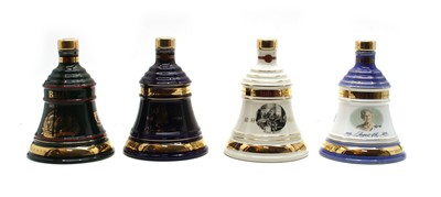 Lot 140 - Bells assorted commemorative whisky decanters of various size
