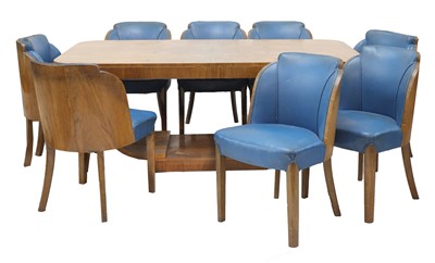 Lot 114 - An Art Deco burr walnut dining suite