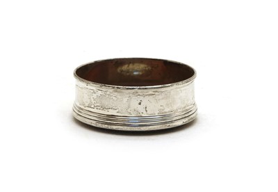 Lot 5 - A silver rimmed wine bottle holder