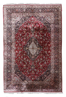 Lot 602 - A Persian wool and silk Kashan carpet