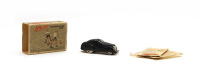 Lot 105 - A boxed Schuco tinplate 'Telesteering Car 3000'