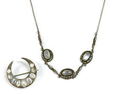 Lot 33 - An Edwardian silver moonstone crescent brooch