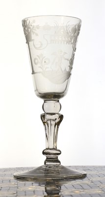Lot 882 - An engraved glass goblet