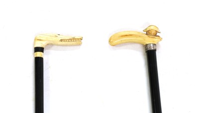 Lot 144 - A carved-ivory handled walking cane
