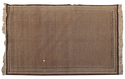 Lot 504 - A woven rug
