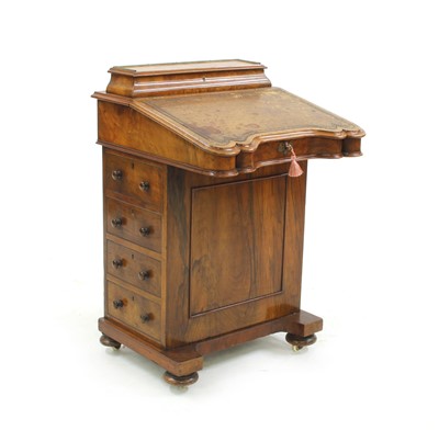 Lot 300 - A Victorian walnut davenport