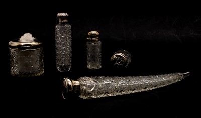 Lot 9 - A collection of silver topped dressing table items