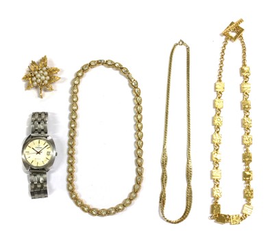 Lot 247 - A Trifari gilt metal paste set necklace, c.1970