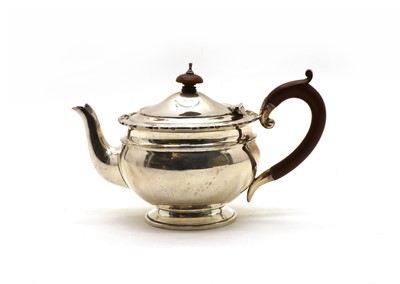 Lot 26 - A George V silver teapot