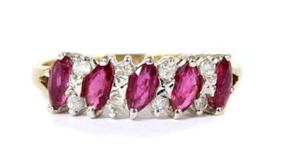 Lot 109 - A 9ct gold ruby and diamond half eternity ring