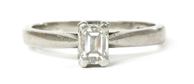 Lot 112 - A platinum single stone emerald cut diamond ring