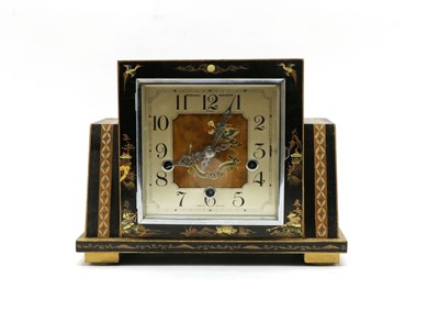 Lot 88 - A black lacquered mantel clock