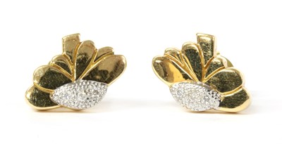Lot 58 - A pair of 18ct gold diamond set daisy stud earrings