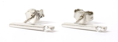 Lot 80 - A pair of 18ct white gold diamond set stud earrings