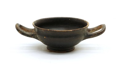 Lot 57 - A Greek Attic ware black glazed kylis
