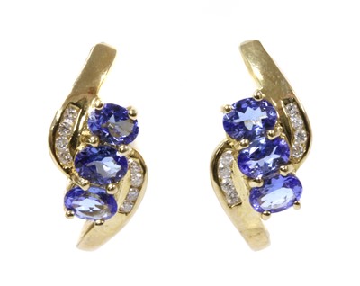 Lot 175 - A pair of gold tanzanite and diamond stud earrings