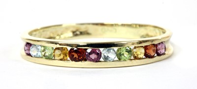 Lot 163 - A gold assorted gemstone half eternity ring