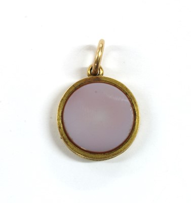 Lot 5 - A gold chalcedony locket