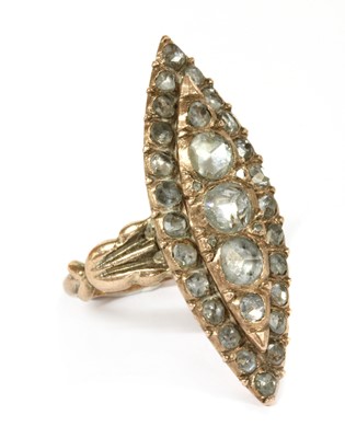 Lot 7 - An early 20th century gold navette shaped diamond cluster ring