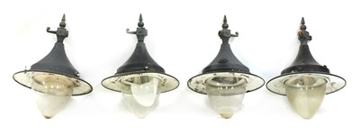Lot 502 - A set of four wall lights