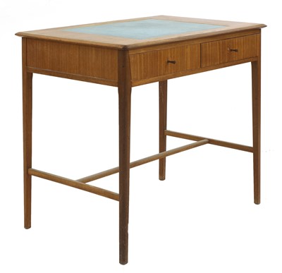 Lot 385 - A teak writing table