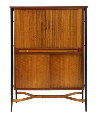 Lot 384 - A teak and maple cocktail cabinet