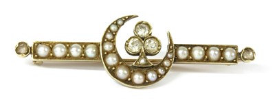 Lot 4 - A late Victorian diamond and split pearl crescent brooch
