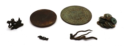 Lot 171 - A Chinese bronze mirror