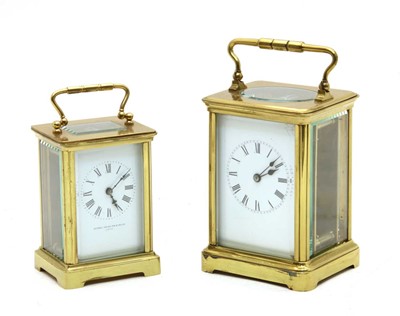 Lot 124 - A French brass carriage timepiece