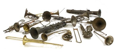 Lot 214 - A collection of French horns, saxophones and trombones