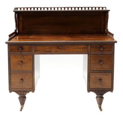 Lot 133 - A colonial rosewood desk