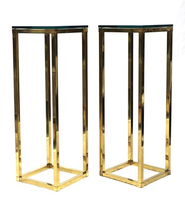 Lot 543 - A pair of Italian brass étagères